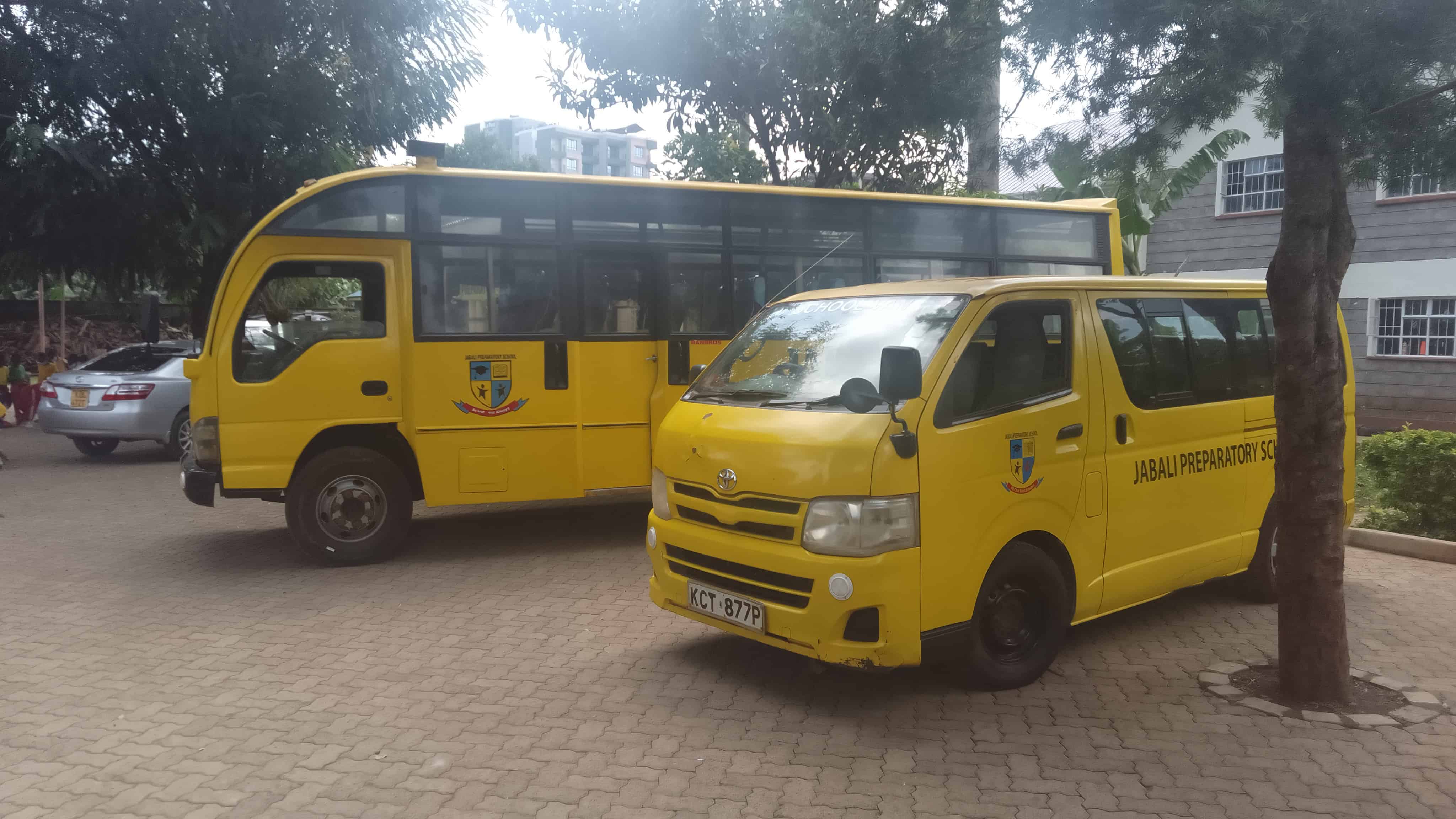 Jabali school vehicles parked in the school parking lot